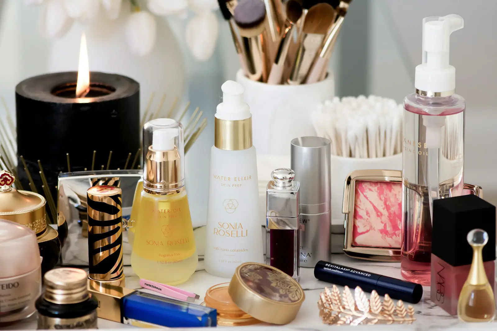 Achieve Radiant Skin: Glowing Skin at Home in 2 Days 4 white and gold perfume bottle