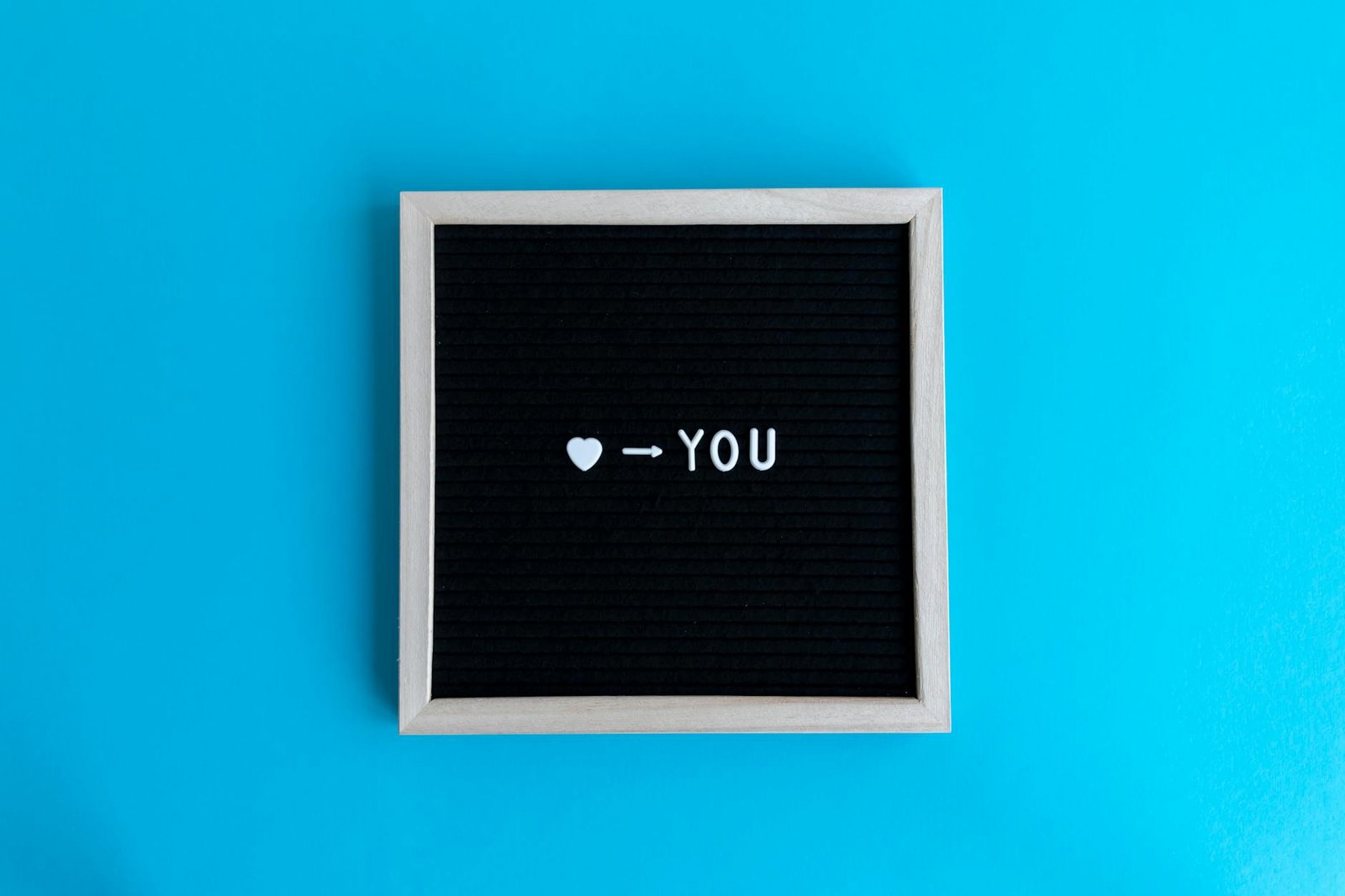 Signs He Likes Me: Decoding the Subtle Signals 1 love you on chalkboard