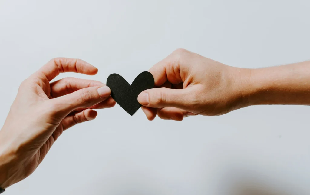 Why Can’t I Move On From My Ex? 4 two person holding papercut heart