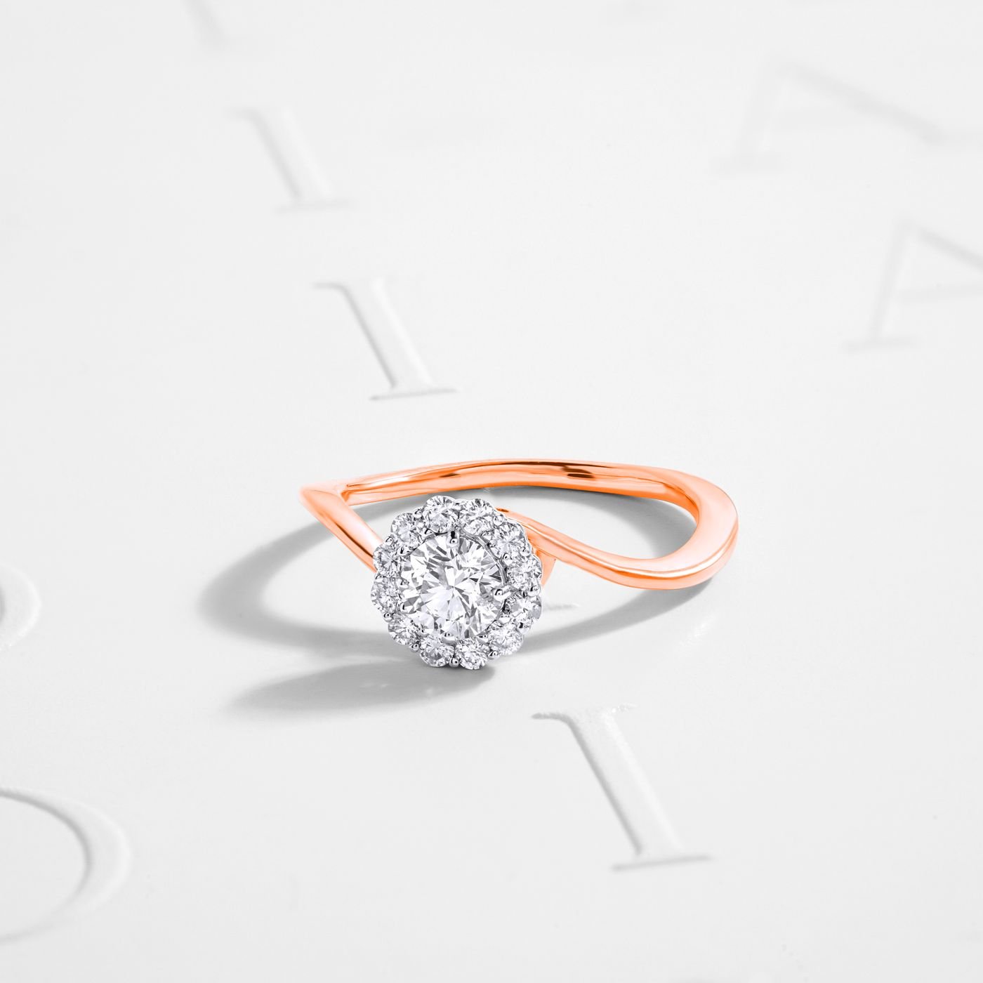 Illustrative diamond ring on a white surface