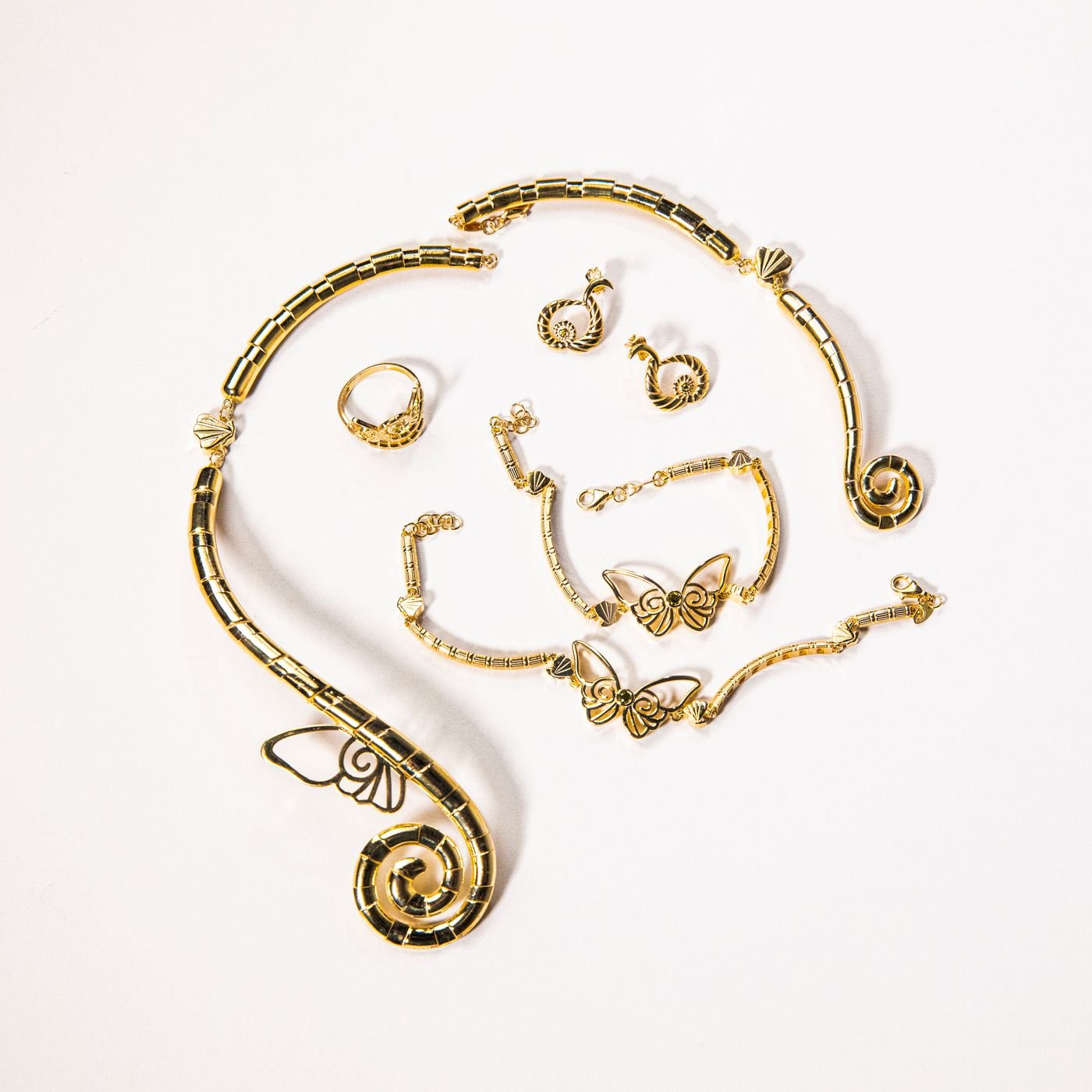 Illustrative gold necklace with matching earrings