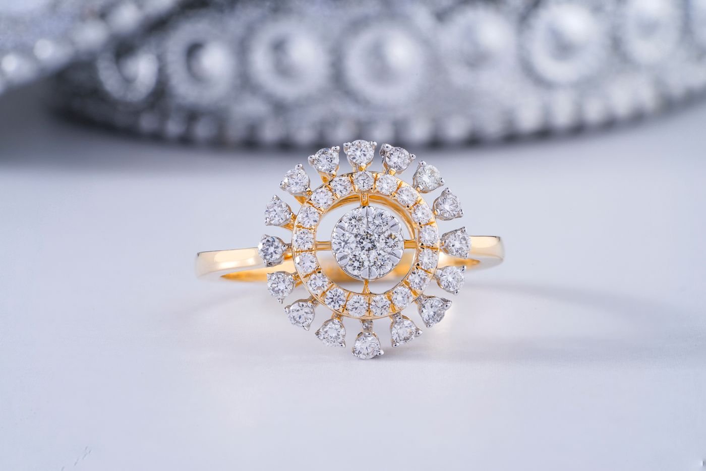 Illustrative close-up of diamond rings on a textured surface
